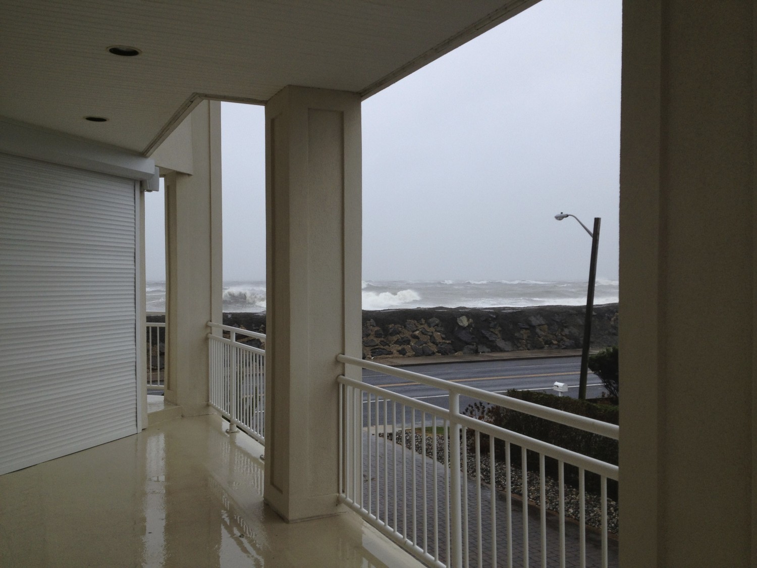 hurricane sandy view from deck shutters waves
